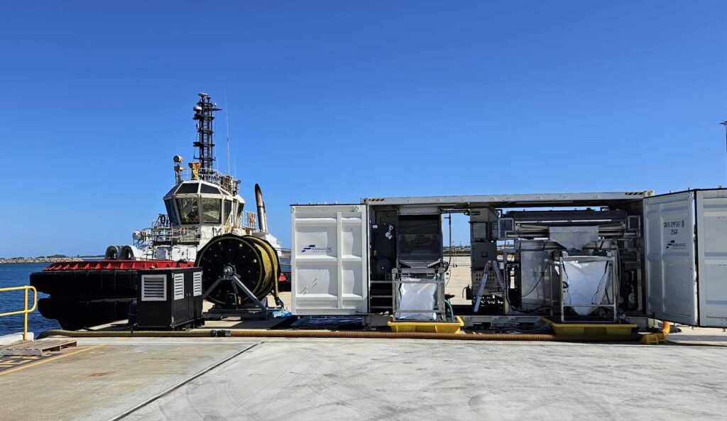 a shipping container on a dock rigged out as a Franmarine workspace