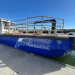 Franmarine work vessel Rohani with rails docked on a small jetty